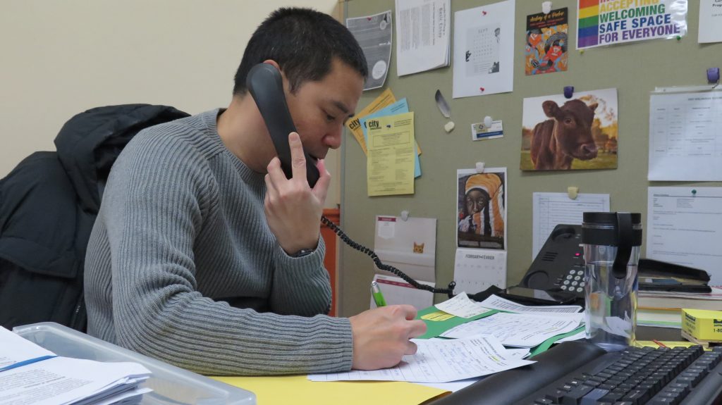 A FEPS program worker speaks to a client over the phone