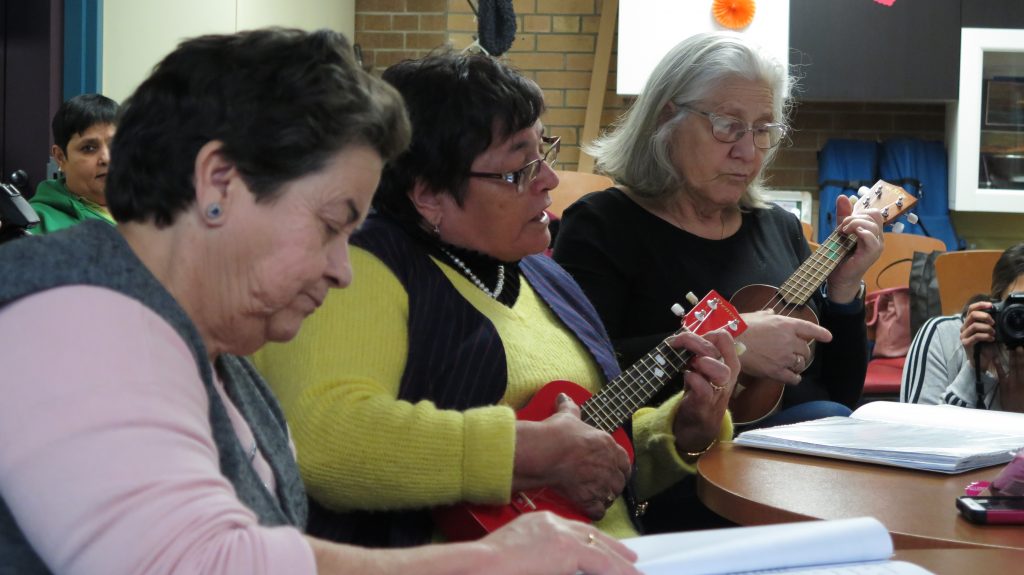 Older adults participate in an activity at the West Active Living and Learning Centre