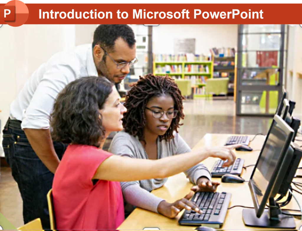 A label reading Introduction to Microsoft PowerPoint above a photo of 3 people around a computer.