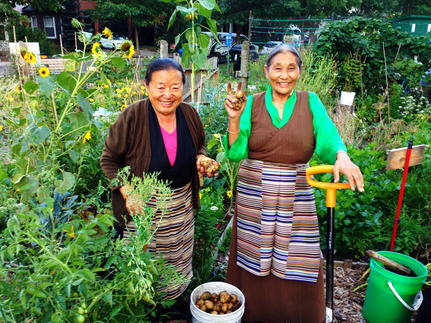 Two women in a garden.