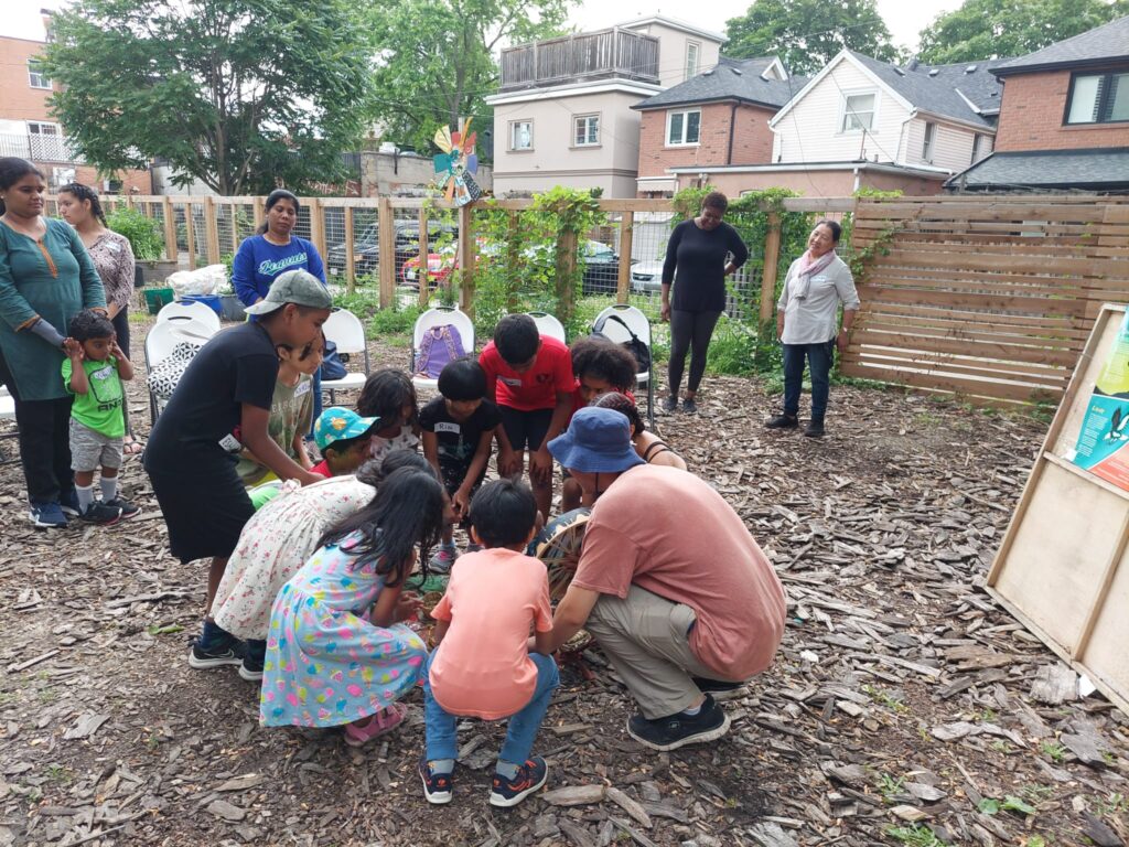 Group of people working in a garden