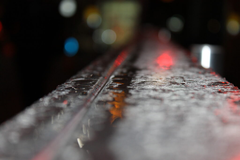Raindrops on a city street.
