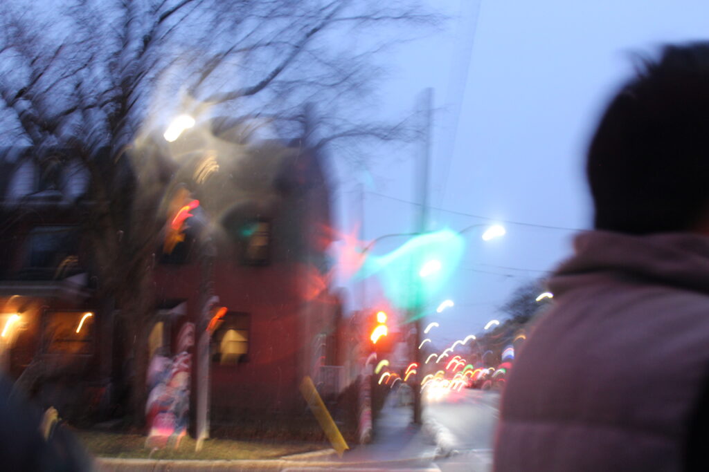 A blurry photo of street lights.