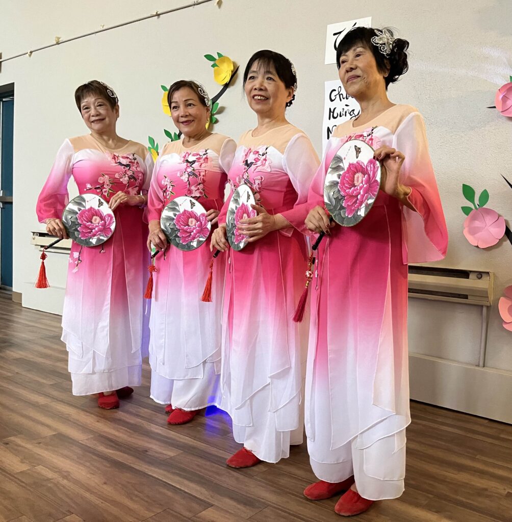 Traditional Asian dancers in costumes